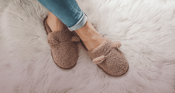 Warm slippers paired with blue jeans